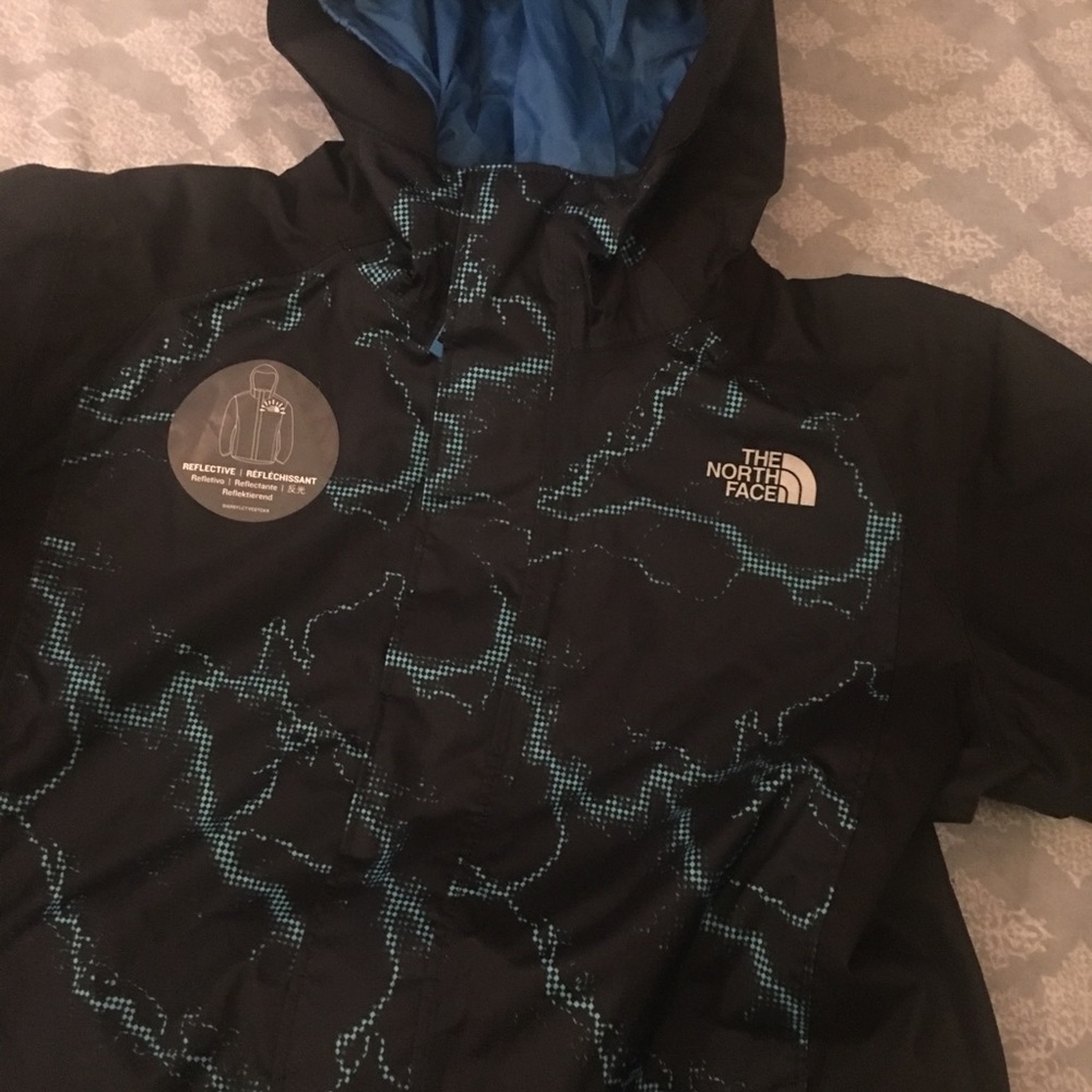 New North face blue youth Medium size jacket.